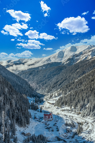 Capra chalet in Fagaras mountains in winter. The ridge of the mountain full of snow. There are one of the beautiful road in the world, Transfagarasan, chalet