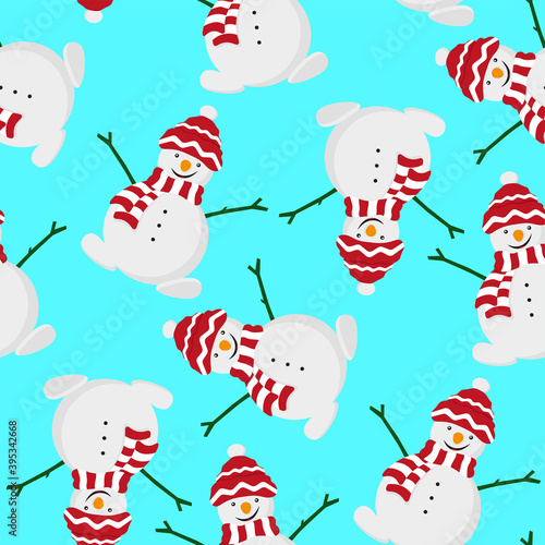 Fototapeta Naklejka Na Ścianę i Meble -  Cheerful white snowmen in a hat and scarf isolated on a blue background. Cute festive seamless pattern. Vector flat graphic hand drawn illustration. Texture.