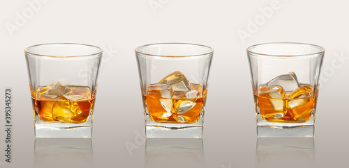 whiskey with ice three glasses