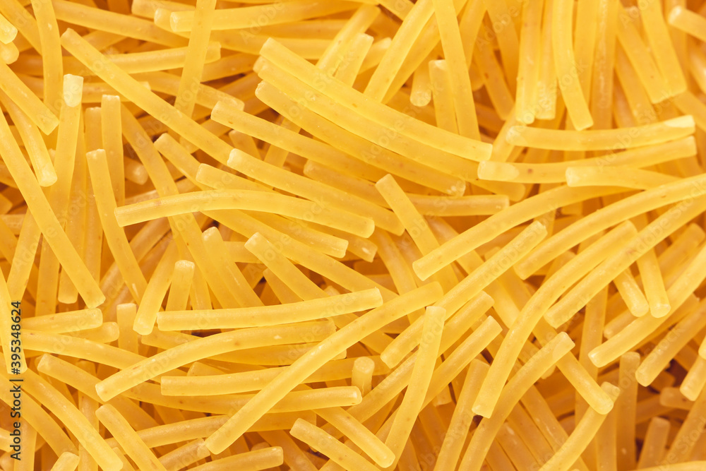 Dry vermicelli pasta backround. Close up view.