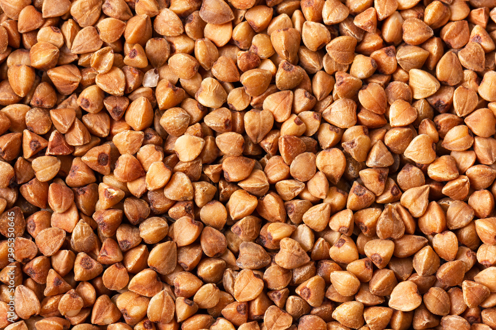 Buckwheat background. Closeup view. Healthy vegan food concept. Buckwheat background. Closeup view. Healthy vegan food concept.