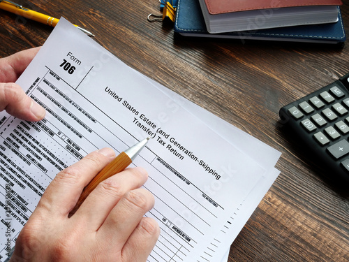 Business concept meaning Form 706 United States Estate (and Generation-Skipping Transfer) Tax Return with phrase on the sheet. photo
