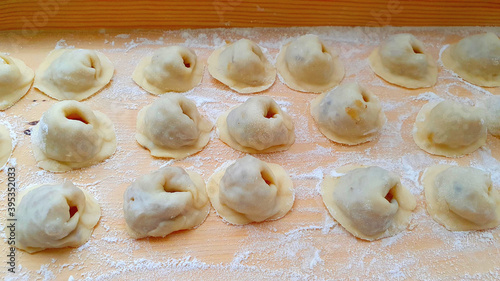 Making homemade dumplings with cabbage and mushrooms