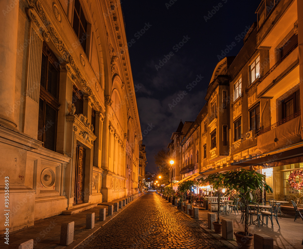 Street in Bucharest downtown by night
