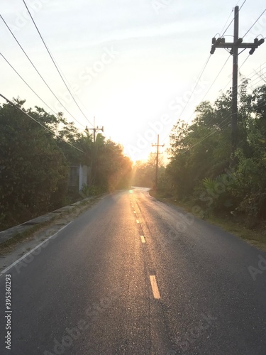 Sunrise over Thai road in Phuket