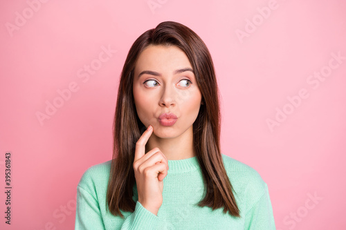 Close up photo of nice person looking empty space hand on chin kiss turquoise pullover isolated on pink color background