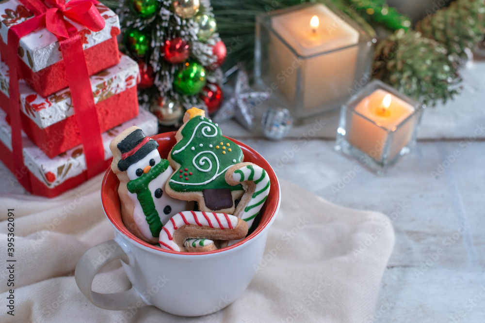 Christmas cookies in a bowl and festive decor on wooden, Christmas cookies with festive decoration, topview