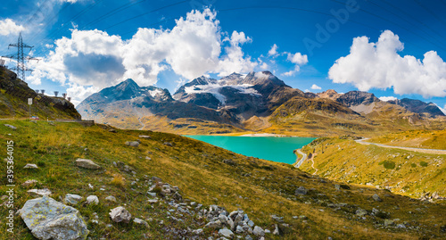 Panorama showing Lago Bianco in the middle of the Swiss Alps in the Bernina Pass  mountain pass