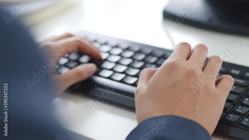 Closeup business people hands typing on keyboard computer desktop for using internet, searching data, working, writing email.