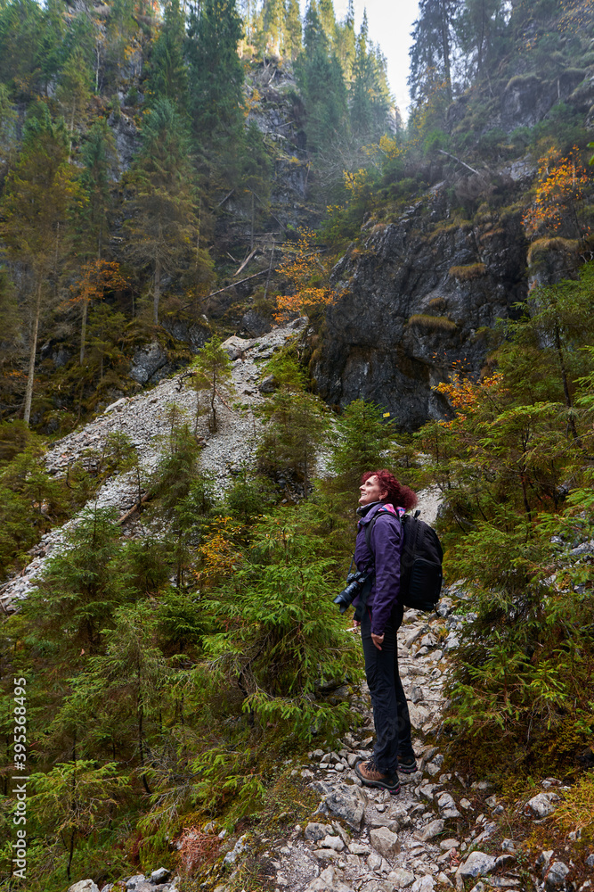 Tourist woman hiking in the mountains Tourist woman hiking in the mountains