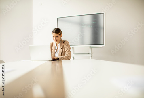 Young woman working on lapt...