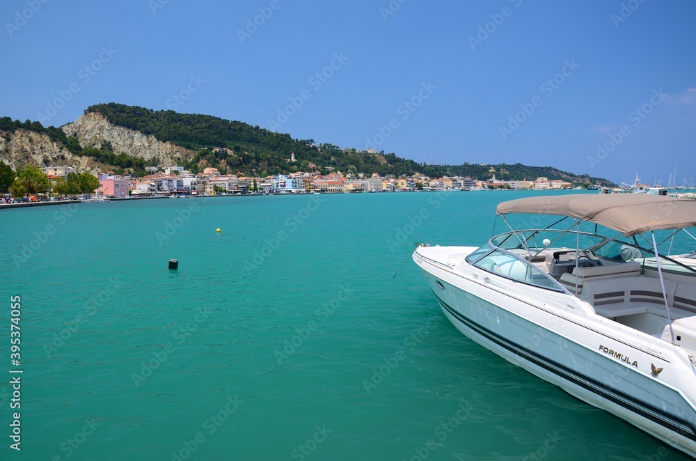 Zante, the capital of Zakynthos. Harbor, boats in the foreground, calm sea, city in the background.