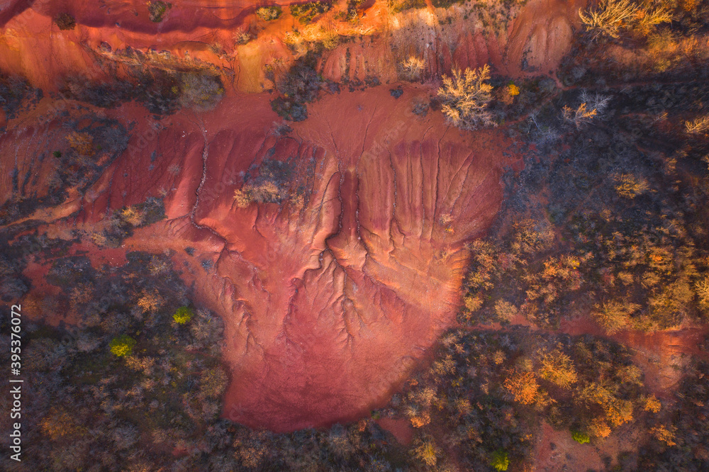 Φωτογραφία Gant, Hungary - Aerial view of abandoned bauxite mine, bauxite formation, the red mountains resembling Martian landscape