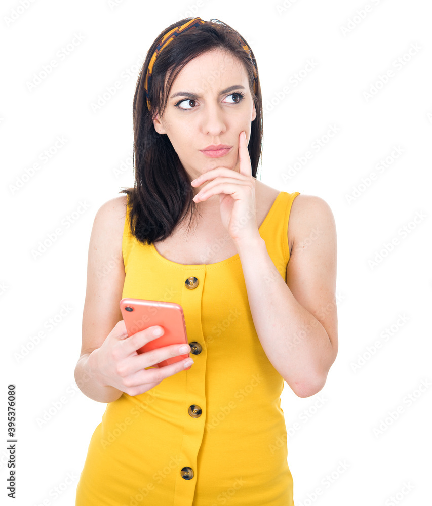 Thinkful girl browse on phone, isolated on white background. Young woman holding smartphone Thinkful girl browse on phone, isolated on white background. Young woman holding smartphone