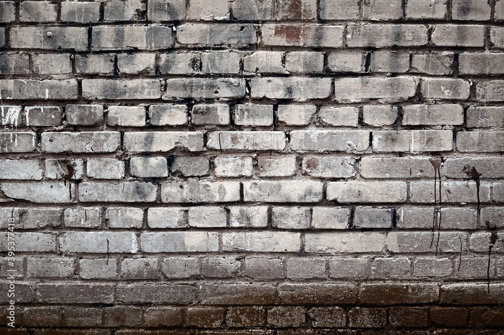 Grungy Rough Urban Background. Empty Grunge Industrial Street With White And Orange Brown Brick Wall. Covered With Plaster Paint Graffiti Brickwork. City Street Backdrop. Grungy Rough Urban Background. Empty Grunge Industrial Street With White And Orange Brown Brick Wall. Covered With Plaster Paint Graffiti Brickwork. City Street Backdrop.