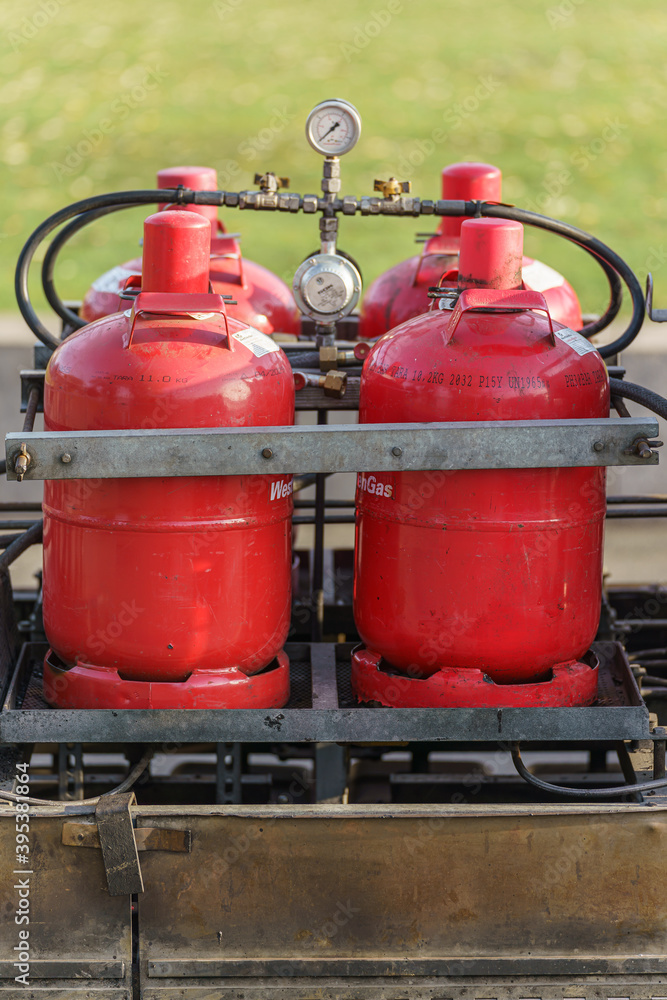 Gas bottles on a trailer with pressure gauge