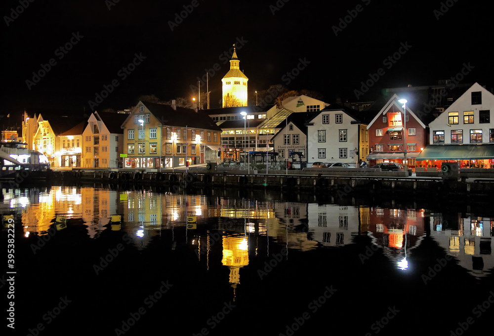 Guest harbour of Stavanger with old-style houses in night, Norway