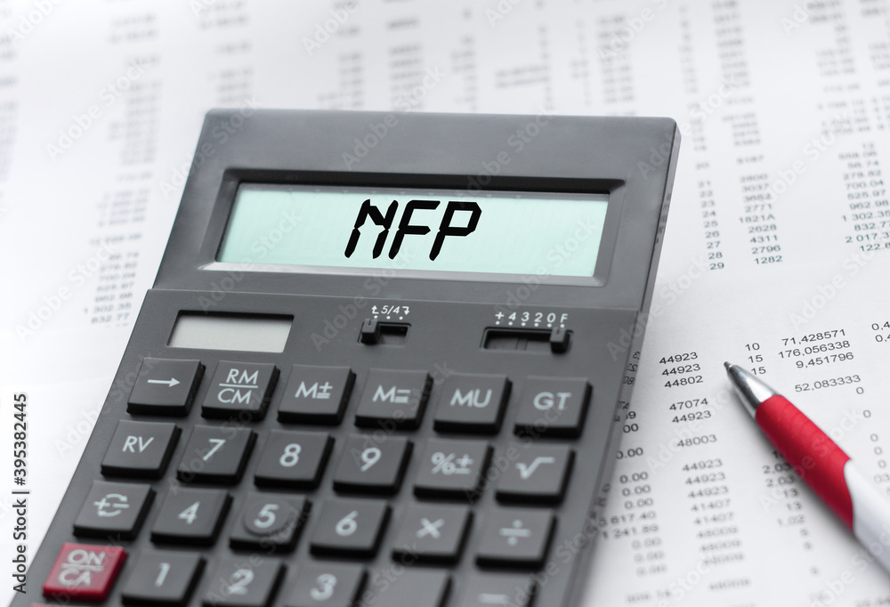 A calculator with the inscription NFP . Business profit concept A calculator with the inscription NFP . Business profit concept