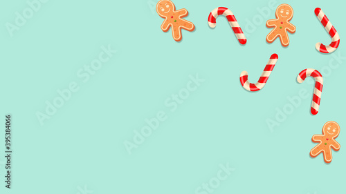 blue background with gingerbread cookies and sweets christmas candy for the holiday christmas or new year