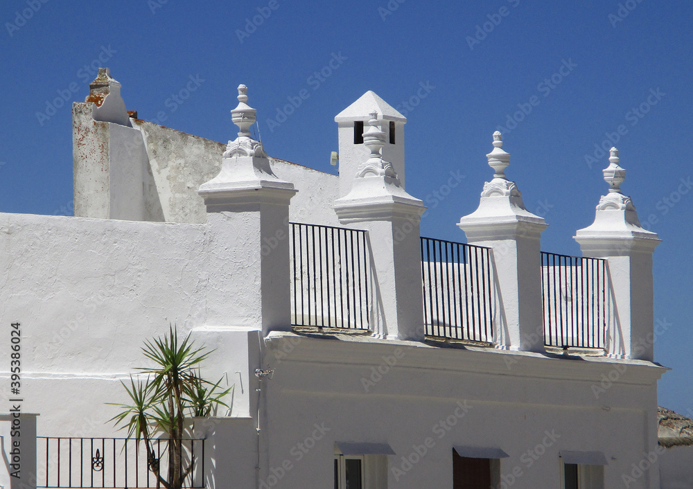 Traditional white building with simple decoration in the old town of Medina Sidonia. Andalusia. Spain. 