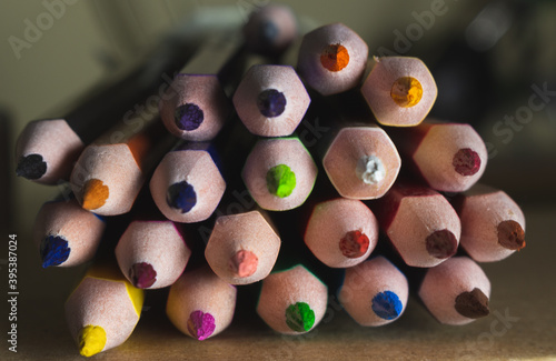 Wooden pencils background colors. Rainbow pencils. Education with colors photo