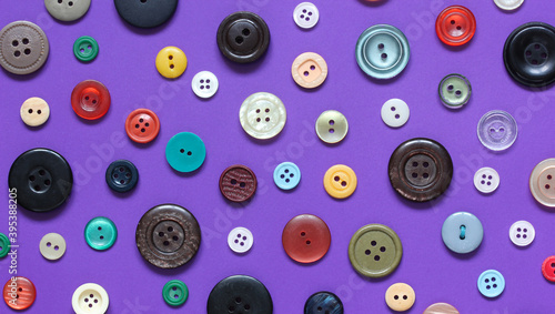 colored plastic buttons on a bright background.