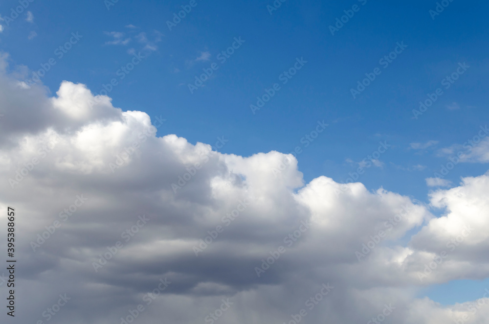 Blue summer sky white cumulus clouds background