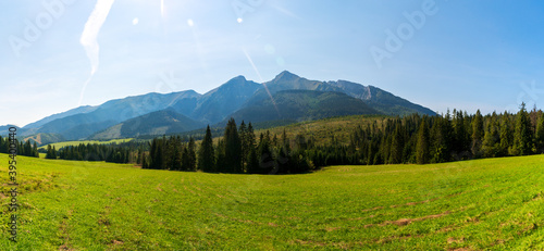 Fototapeta Naklejka Na Ścianę i Meble -  Green mountains and beautiful sky clouds under the blue sky in tatras mountain in poland