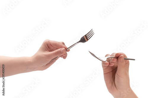 Fork in woman hand isolated on white.