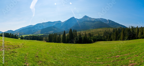 Fototapeta Naklejka Na Ścianę i Meble -  Green mountains and beautiful sky clouds under the blue sky in tatras mountain in poland