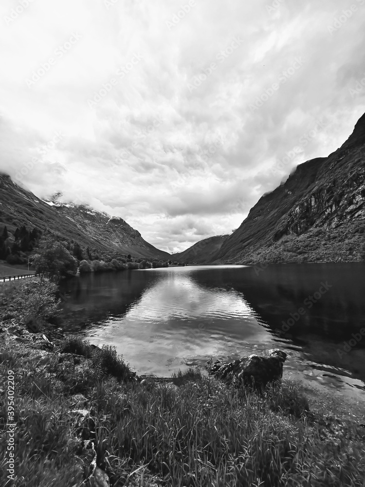 beautiful view from the shore into the Hjorundfjord near Bjorke, Norway