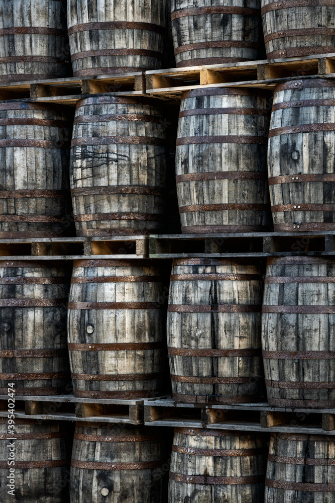 Pattern of Old Wooden Barrels on a Rack Pattern of Old Wooden Barrels on a Rack
