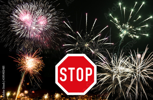 Prohibition of fireworks on New Year's Eve in the city due to corona virus, no New Year's party due to high infection with Covid 19, concept with stop sign photo