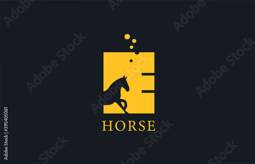 E yellow horse alphabet letter logo icon with stallion shape inside. Creative design for company and business