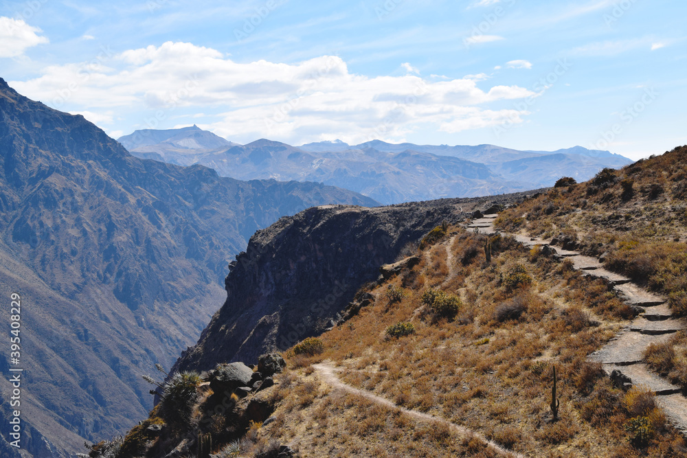 Obraz premium Hiking trail and footpath up in the mountains to a viewing point where you can spot condors. Photo taken in Colca Canyon, Peru