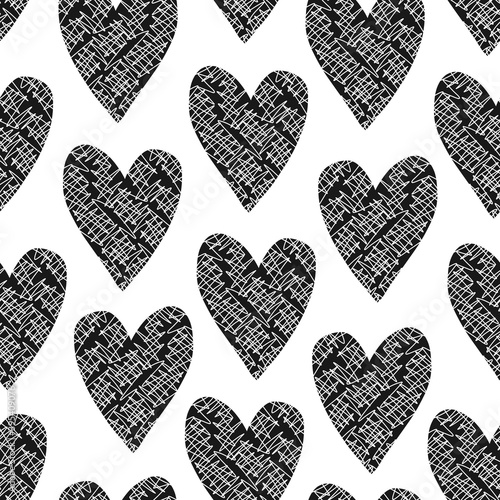 Cute seamless pattern with black hand drawn textured hearts on white background. Lovely vector texture with doodle heart shapes for St. Valentines wrapping paper, surface, wallpaper, textile