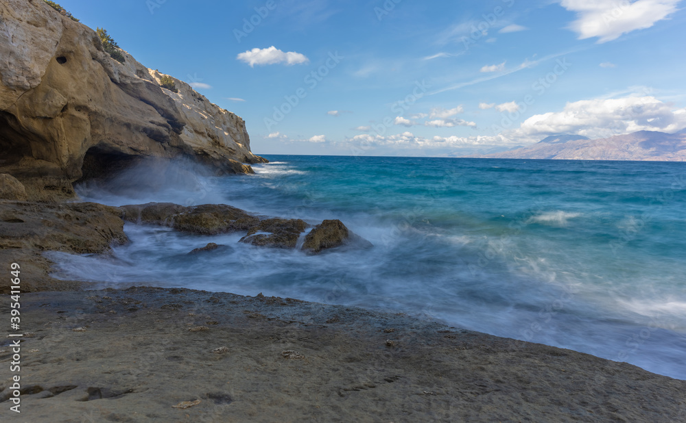 Dramatic sunset over the beach in Matala, Southern Crete, Greece. Dramatic sunset over the beach in Matala, Southern Crete, Greece.