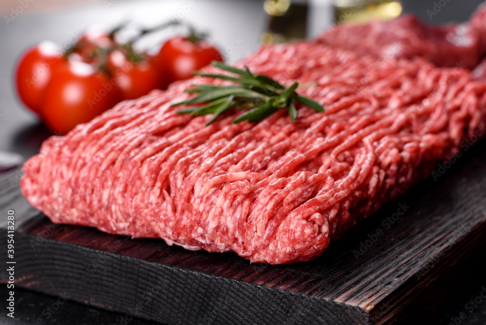 Fresh raw beef mince on a dark background Fresh raw beef mince on a dark background