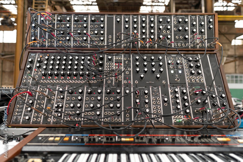 Big modular analog classic synthesizer front view. Vintage dj musician setup.