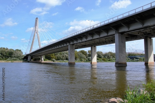 Swietokrzyski Bridge over Vistula river, Warsaw, Poland. Modern, cable-stayed bridge with single tower and cables attached supporting the deck. 