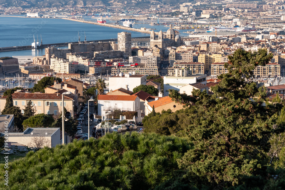 View of the city of Marseille from the hill where Notre-Dame de la Garde is located. View on the coast and the Mediterranean sea. 