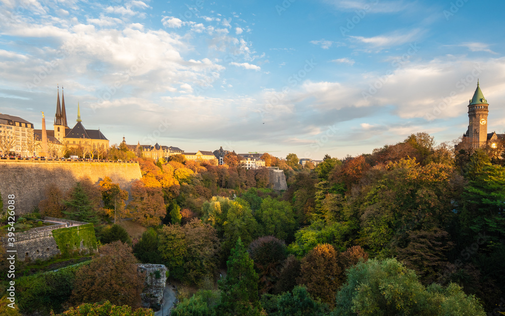 View of the city of Luxembourg-city in Luxembourg, at sunset. The city is famous for its many parks. 