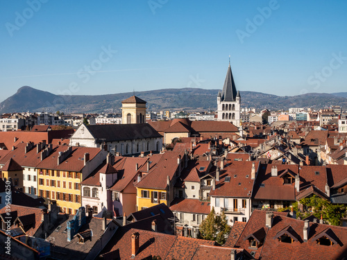 Wallpaper Mural Cityscape of Annecy, in Savoie, France. View on the streets of the old center. Blue sky, autumn. Sunny day. Mountains in the background. Torontodigital.ca