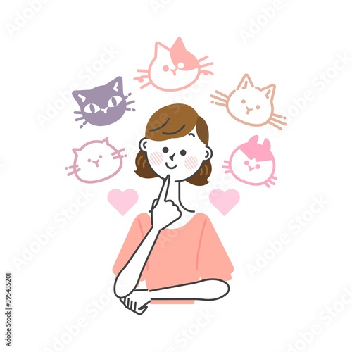 どの猫を飼おうかと楽しく悩んでいる女性