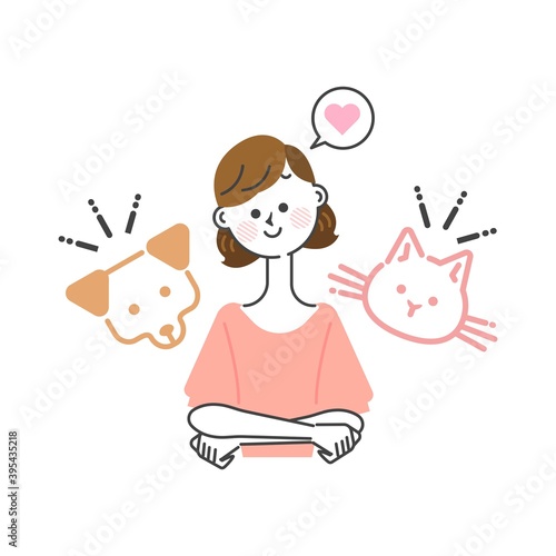 犬を飼うか猫を飼うか楽しく悩んでいる女性