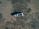 Beautiful Aerial view of an Aground motorboat on the reef barrier