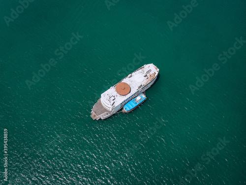 Aerial drone top view photo of luxury yacht with blue boat. Phuket. Thailand.