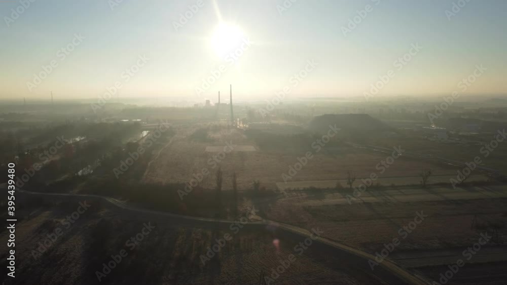 Aerial view of a thermal power plant. Cogeneration plant. Industrial heat supply for a big city. Aerial view of a thermal power plant. Cogeneration plant. Industrial heat supply for a big city.