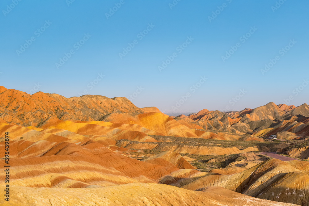 Naklejka premium rainbow hilly landscape at dusk in zhangye