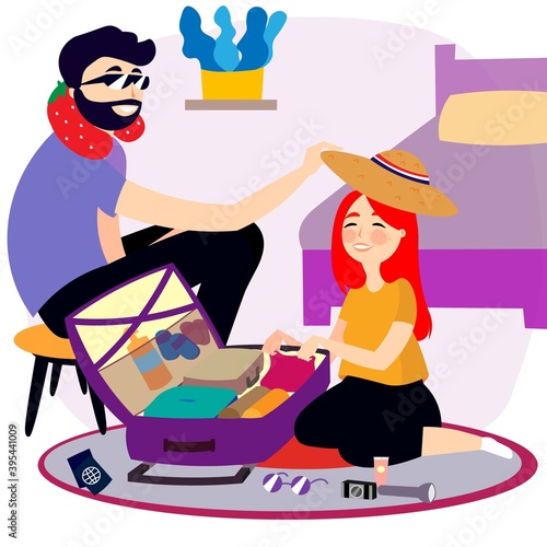 Pareja contenta preparando sus maletas para viajar e ir de vacaciones